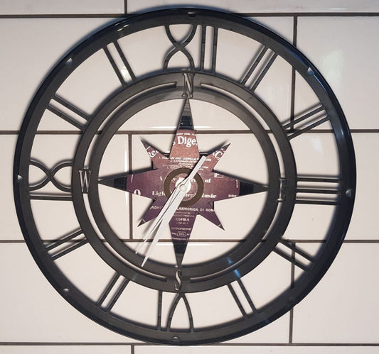 Decorative wall clock with Compass Rose design on a tiled wall