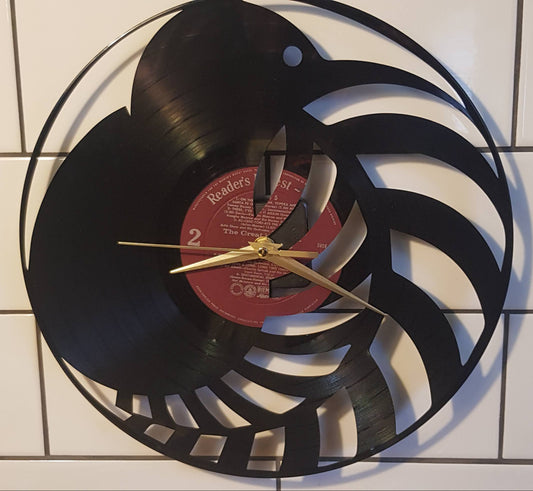 Wall clock made from a vinyl record with a Kiwi and fern Design 